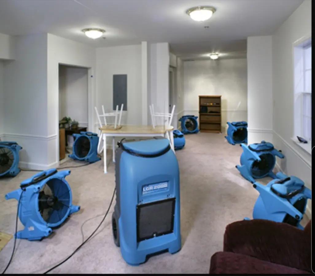 Air movers and dehumidifier setup for Water Damage Restoration in Kearney